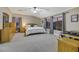Spacious bedroom features plush carpeting, multiple windows, and ample natural light at 781 Wigan Pier Dr, Henderson, NV 89002