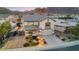 Stunning two-story home features a well-manicured front yard, a two car garage, and a charming front porch at 781 Wigan Pier Dr, Henderson, NV 89002