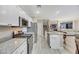 Modern kitchen featuring stainless steel appliances and granite countertops, open concept at 781 Wigan Pier Dr, Henderson, NV 89002