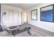 Spacious exercise room with fitness equipment, mirrors, and plenty of natural light at 7920 Pandora Sky St # 281, North Las Vegas, NV 89084