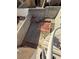 Aerial view of unfinished backyard featuring cinder block retaining wall and spiral staircase at 8049 Celestial Ave # 201, Las Vegas, NV 89128