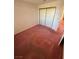 Cozy bedroom featuring a sliding door closet and a neutral color scheme at 8049 Celestial Ave # 201, Las Vegas, NV 89128
