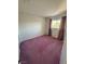 Bedroom with neutral walls, neutral carpeting and lots of natural lighting at 8049 Celestial Ave # 201, Las Vegas, NV 89128