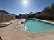 Community pool with clear blue water, ample seating, and meticulous upkeep at 8049 Celestial Ave # 201, Las Vegas, NV 89128