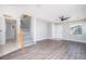 Spacious living room with hardwood floors and a staircase leading to the second floor at 8174 Amphora St, Las Vegas, NV 89139