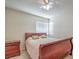 Bedroom featuring a wooden bed frame, a side table, and natural light, creating a calm and inviting space at 8308 Tide Pool Dr, Las Vegas, NV 89128