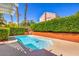Inground pool nestled within a private backyard surrounded by lush landscaping at 8308 Tide Pool Dr, Las Vegas, NV 89128
