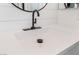 This bathroom features a white quartz countertop and brushed black faucet at 8345 Spruce Meadows Ave, Las Vegas, NV 89131