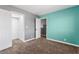 Comfortable bedroom with walk-in closet and stylish two-tone color scheme at 8345 Spruce Meadows Ave, Las Vegas, NV 89131