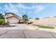 Charming single-Gathering home with a well-maintained yard and a two-car garage, offering curb appeal at 8345 Spruce Meadows Ave, Las Vegas, NV 89131