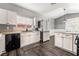 Bright kitchen with stainless steel appliances, granite countertops, and ample cabinet space at 8345 Spruce Meadows Ave, Las Vegas, NV 89131