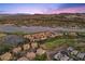 Panoramic aerial image of Lake Las Vegas featuring a community of homes nestled near the waterfront at 85 Luce Del Sole # 2, Henderson, NV 89011