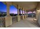 Expansive balcony featuring stately columns and a decorative railing, perfect for enjoying outdoor living at 85 Luce Del Sole # 2, Henderson, NV 89011