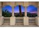 Beautiful balcony with stone columns and a decorative railing offers breathtaking views of the landscape at 85 Luce Del Sole # 2, Henderson, NV 89011