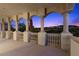 Spacious balcony with stone columns and wrought iron railings provides scenic views of the surrounding area at 85 Luce Del Sole # 2, Henderson, NV 89011