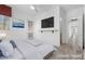 Bedroom features a ceiling fan, and an accent wall with an entertainment console at 85 Luce Del Sole # 2, Henderson, NV 89011