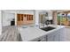 Modern kitchen with a large island, stainless steel appliances, and an open floor plan at 85 Luce Del Sole # 2, Henderson, NV 89011