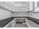 Bright office space featuring custom built-in shelving and a sleek countertop desk area at 85 Luce Del Sole # 2, Henderson, NV 89011
