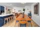 Open-concept view of dining room to living room and kitchen island at 8924 Sail Bay Dr, Las Vegas, NV 89117