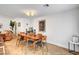 Bright dining room features modern lighting, neutral walls, and wood floors at 8924 Sail Bay Dr, Las Vegas, NV 89117