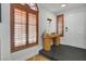 Welcoming foyer with decorative shutters, sleek flooring, and a stylish console table at 8924 Sail Bay Dr, Las Vegas, NV 89117