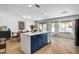 Bright open kitchen with view to bay window and dining room at 8924 Sail Bay Dr, Las Vegas, NV 89117