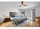 Spacious main bedroom boasts wood floors, ceiling fan, and French doors at 8924 Sail Bay Dr, Las Vegas, NV 89117
