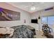 Bedroom with desk, Astroworld flag, and white dresser at 8962 Shale Valley St, Las Vegas, NV 89123