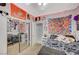 Bedroom with ceiling fan, mirrored closet doors, and wall art at 8962 Shale Valley St, Las Vegas, NV 89123