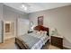 Bright bedroom with neutral tones, carpet, and plenty of closet space at 8962 Shale Valley St, Las Vegas, NV 89123