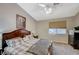 Inviting bedroom with a plush bed, soft carpet, and ample natural light at 8962 Shale Valley St, Las Vegas, NV 89123