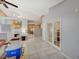 Bright and spacious living room with tile flooring and high ceilings, filled with moving boxes at 8962 Shale Valley St, Las Vegas, NV 89123