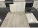 Kitchen design featuring a Glyde Matte Black faucet, Simply White quartz counters and Elkins White cabinetry at 9077 Rivington Ave, Las Vegas, NV 89148