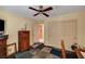 Bedroom showing closet, ceiling fan, door and wood furniture at 9912 Woodhouse Dr, Las Vegas, NV 89134
