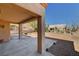 Covered patio showing desert landscaping and the exterior of a home at 9912 Woodhouse Dr, Las Vegas, NV 89134