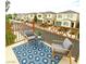 Cozy balcony with seating, a table, and community views at 10372 Beautiful Fruit St, Las Vegas, NV 89183