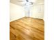 Spacious bedroom showcases hardwood floors and a private exterior entrance at 10372 Beautiful Fruit St, Las Vegas, NV 89183