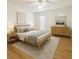 Bright bedroom featuring a ceiling fan, natural light, and modern decor at 10372 Beautiful Fruit St, Las Vegas, NV 89183