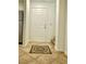Home entryway featuring lovely rug and natural light at 10372 Beautiful Fruit St, Las Vegas, NV 89183