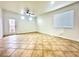Large bright open living room with ceramic tile at 10372 Beautiful Fruit St, Las Vegas, NV 89183