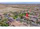 Community aerial view showcasing the home with nearby amenities and mountain views at 10409 Snowdon Flat Ct, Las Vegas, NV 89129