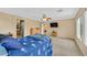 Spacious bedroom with closet, ceiling fan, and bright, neutral-toned walls at 10409 Snowdon Flat Ct, Las Vegas, NV 89129