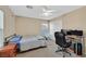 Well-lit bedroom with carpet, a window, and essential furnishings at 10409 Snowdon Flat Ct, Las Vegas, NV 89129