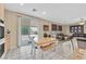 Eat-in kitchen with a dining table and sliding door to the backyard at 10409 Snowdon Flat Ct, Las Vegas, NV 89129