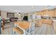 Open kitchen and dining area that flows into the living room at 10409 Snowdon Flat Ct, Las Vegas, NV 89129