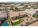 Aerial view of a single-Gathering home with swimming pool and desert landscaping at 1043 Armillaria St, Henderson, NV 89011