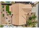 This aerial rooftop showcases the expansive tile roof, synthetic grass, brick patio, and desert landscaping at 1043 Armillaria St, Henderson, NV 89011
