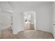 Welcoming foyer with tile flooring, leading to an open living space and bathroom at 1043 Armillaria St, Henderson, NV 89011