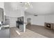 Bright kitchen with granite countertops, stainless steel appliances, and an open view to living room at 1043 Armillaria St, Henderson, NV 89011