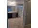 Bathroom featuring tiled flooring, a sleek vanity, and a glass-enclosed shower at 10609 Sand Mountain Ave, Las Vegas, NV 89166